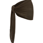 Brown sarong tied into a knot on a white background