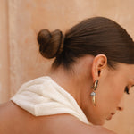 Back close up shot of halter neck detail on dress.