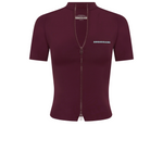 A short-sleeve zip-up top in burgundy, featuring a full-length front zipper, a mock neck collar, and the brand name 'ROGUE SEASON' printed in blue on the left chest.
