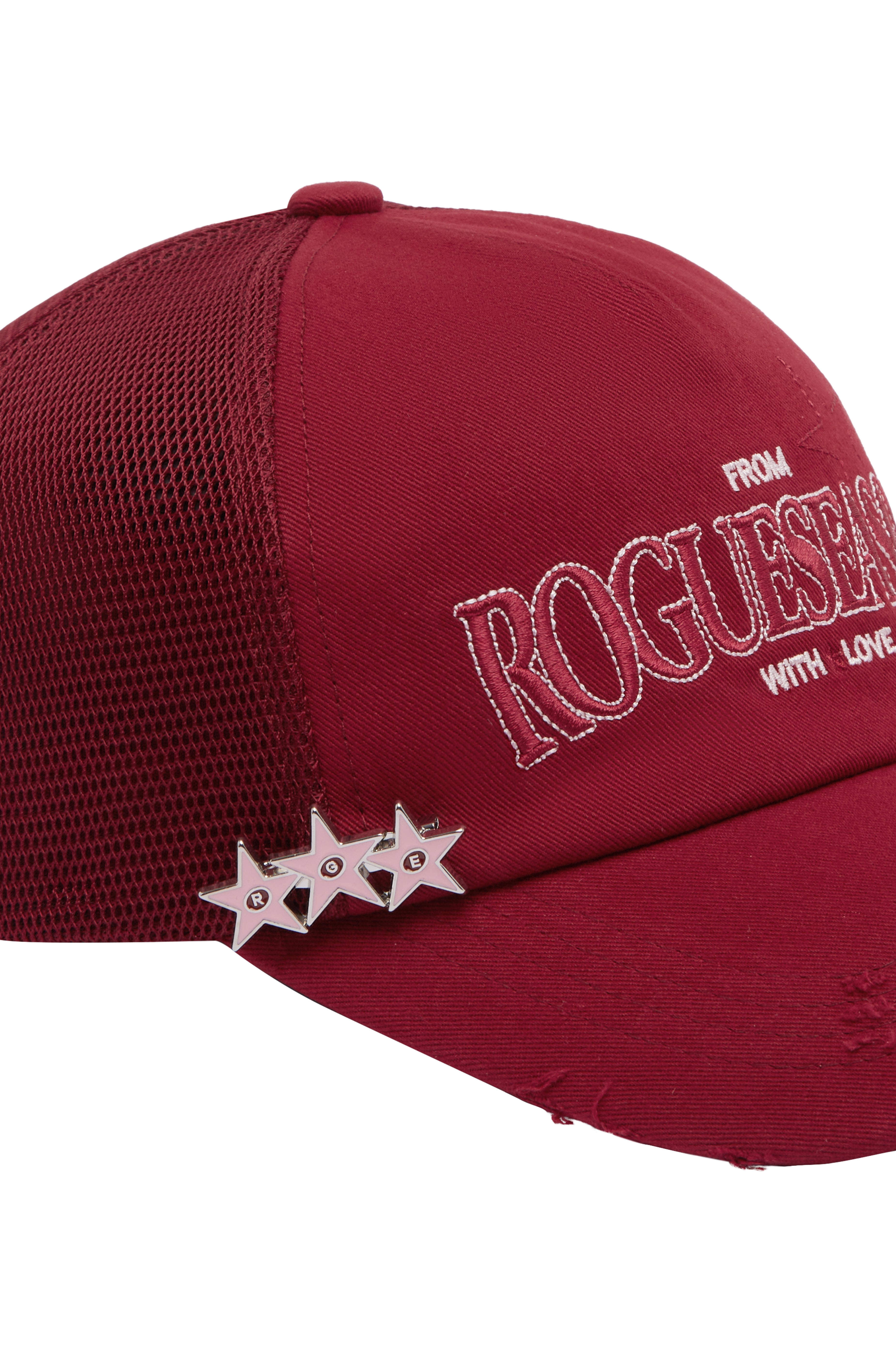 Close up detail shot of red cap with 'ROGUESEASON' branding and star design on a white background