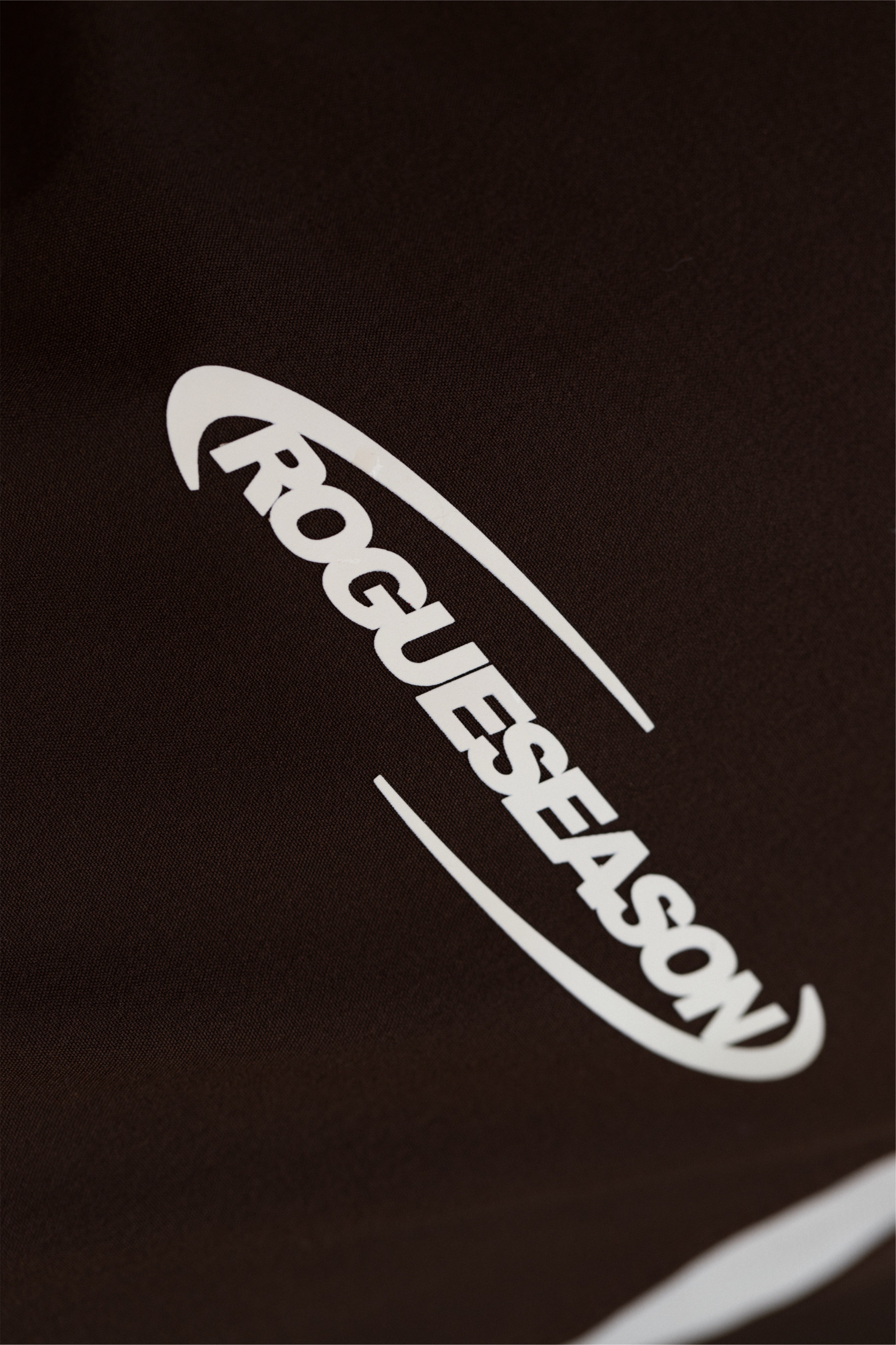 Close up shot of logo featured on the pants.