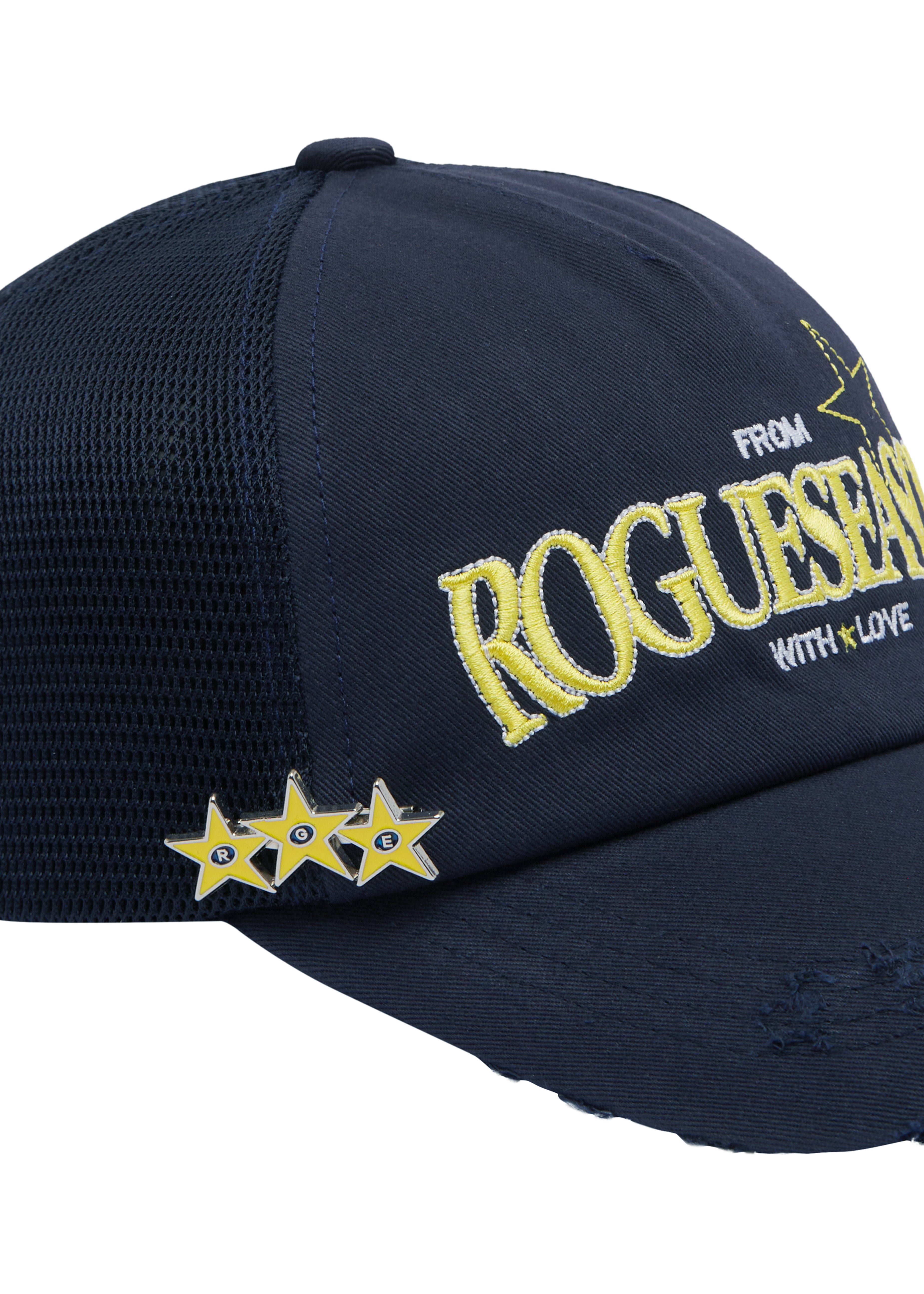 Close up detail shot of navy hat with 3 star pin attached to hat. Yellow text 'ROGUESEASON' on hat.