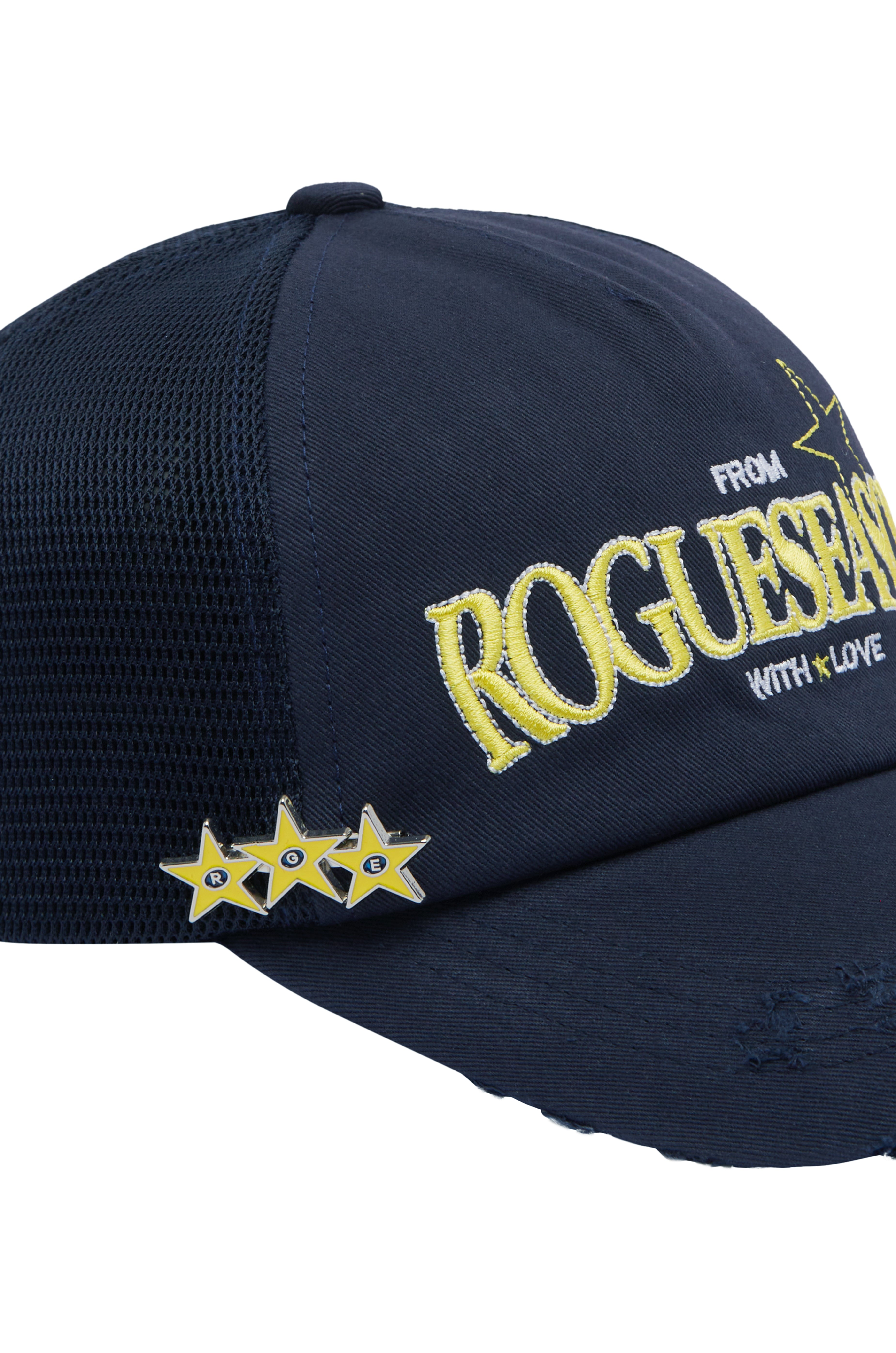 Close up detail shot of navy hat with 3 star pin attached to hat. Yellow text 'ROGUESEASON' on hat.