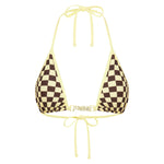 A triangle bikini top with a brown and checkerboard pattern on the cups, featuring pastel yellow tie straps and a matching waist tie, displayed on a solid white background.
