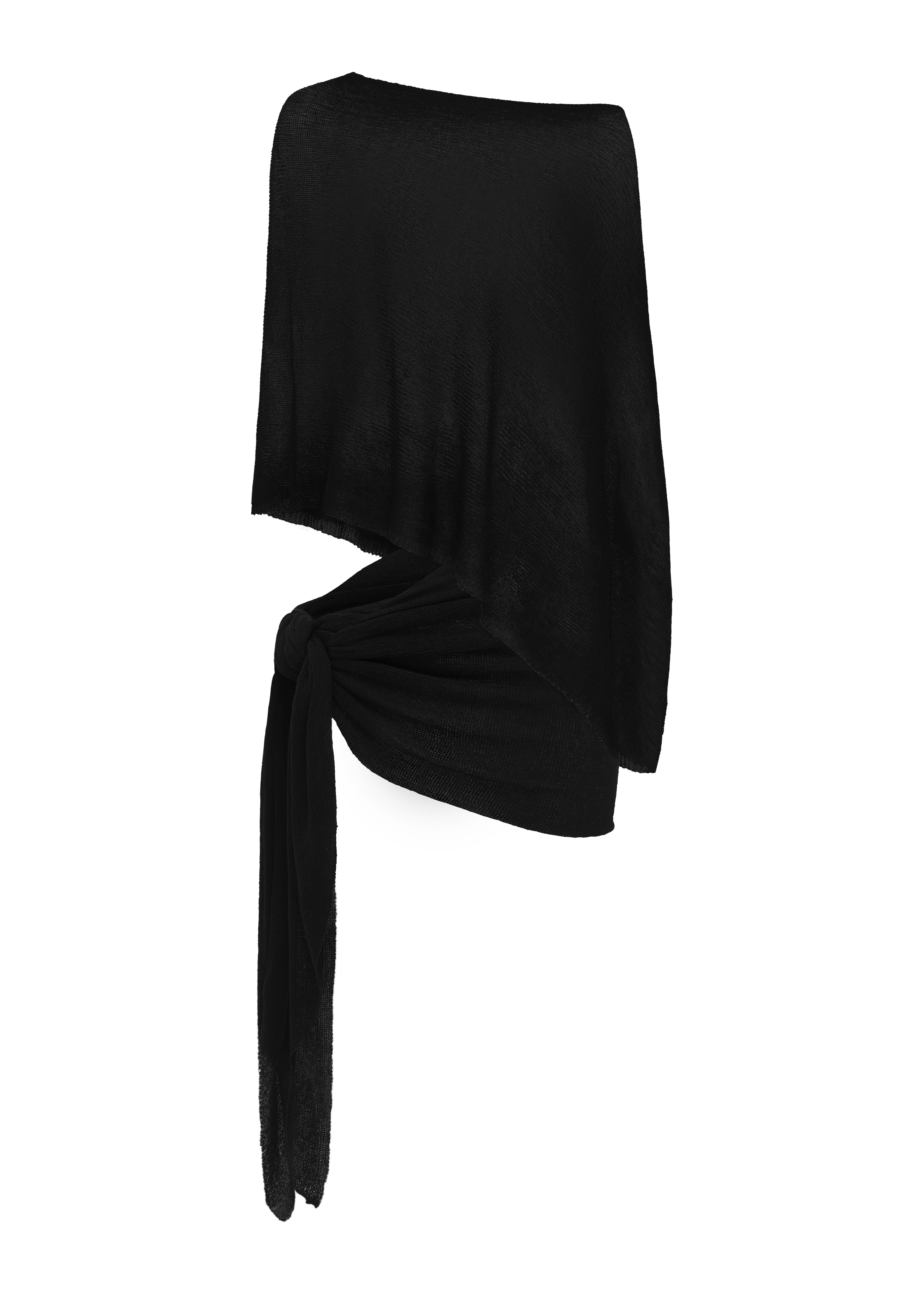 A black sarong and black matching cape on a white background.
