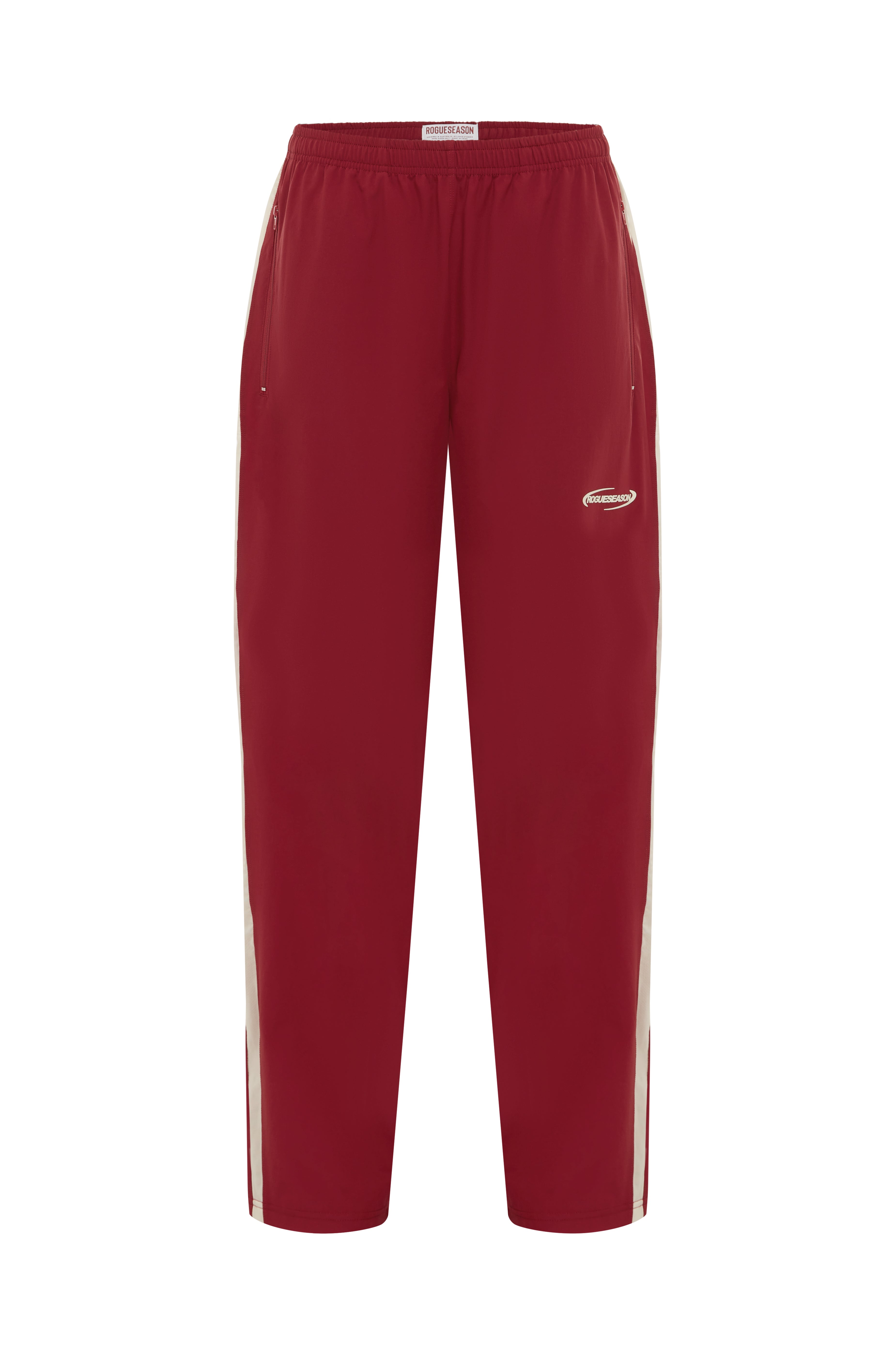Cherry pants with yellow logo detailing on a white background