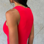 Close up shot of one piece swimsuit fabric being worn on model.