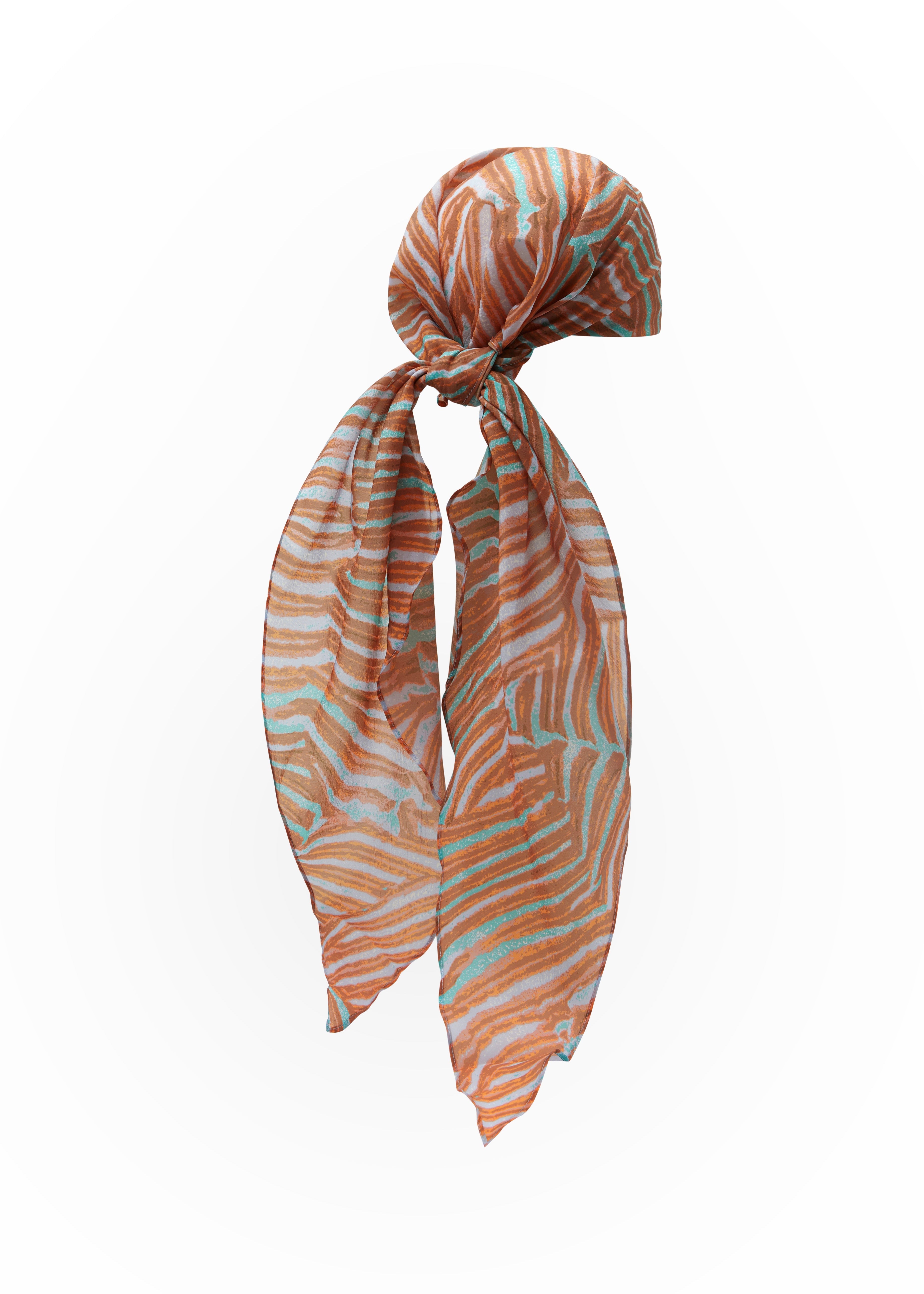 Coral print headscarf with orange and teal pattern on a white background