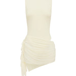 Ivory one piece swimsuit styled with a ivory ruched sheer mini skirt on a white background.