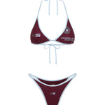 A two-piece bikini set featuring a burgundy triangle top and matching bottom with baby blue trim. The top has s printed logo, including 'ROQUE SEASON' and a crest, while the bottom features a small 'RS' logo.