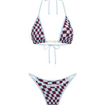 A two-piece bikini set featuring a burgundy and baby blue checkerboard pattern with baby blue trim and tie straps, displayed against a solid white background.