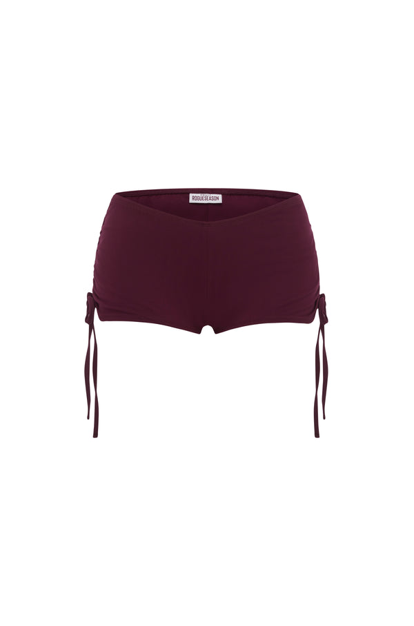 Micro burgundy shorts with side tie details, shown against a plain white background.
